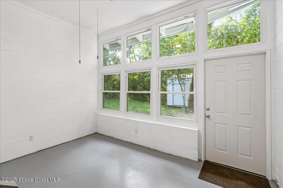 2302 Ruffner Road Melbourne, FL 32901 - Photo 44 of 80 an empty room with a window