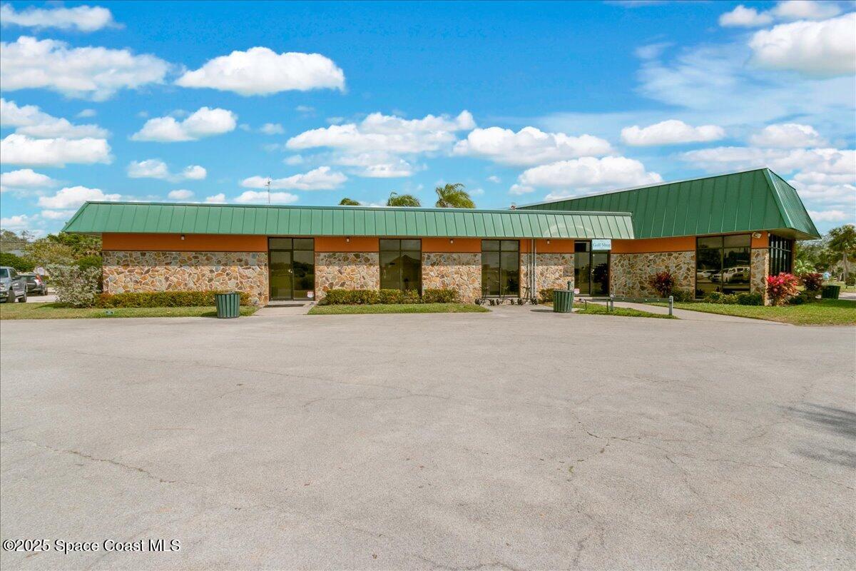 2302 Ruffner Road Melbourne, FL 32901 - Photo 50 of 80 a view of a house with a yard