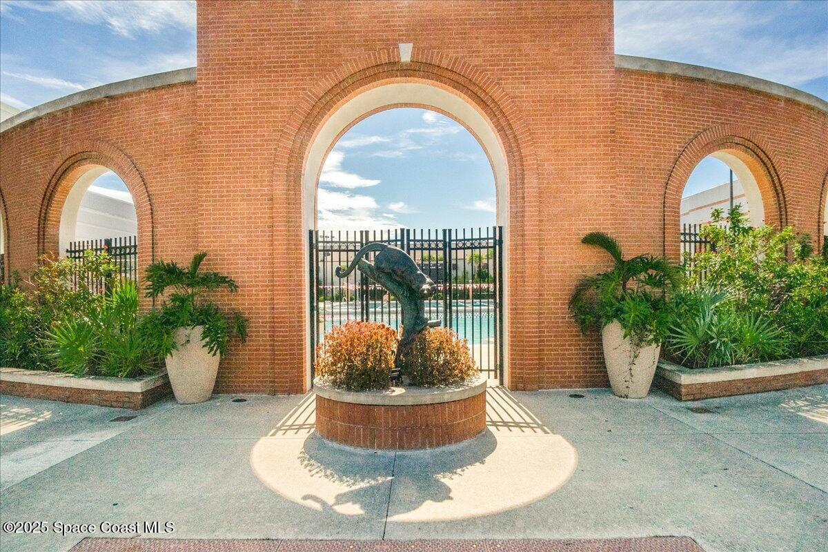 2302 Ruffner Road Melbourne, FL 32901 - Photo 68 of 80 a view of a glass door with potted plants
