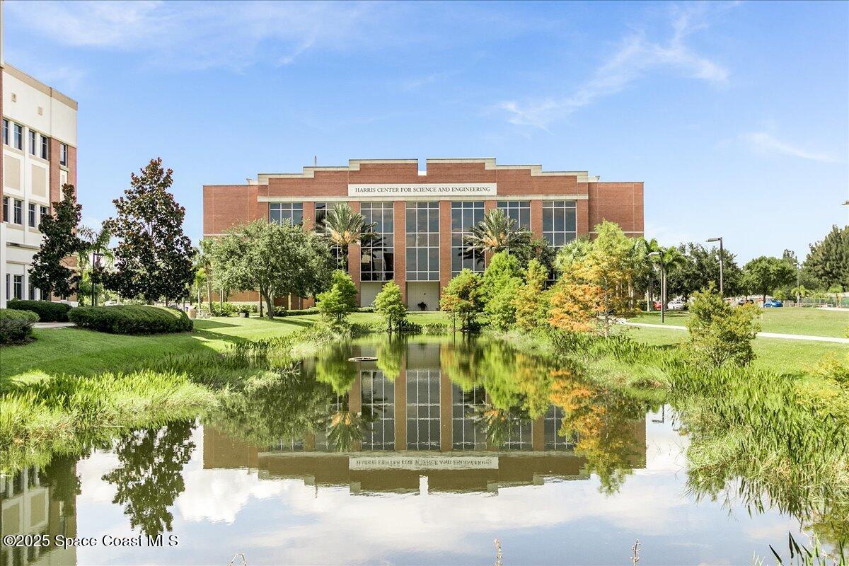 2302 Ruffner Road Melbourne, FL 32901 - Photo 79 of 80 a view of a big building with garden