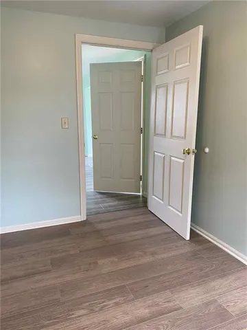 a view of entryway with wooden floor