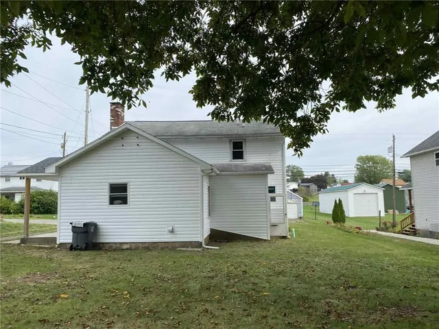 a view of a backyard with a garden