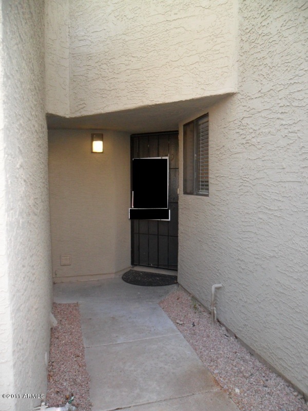 985 North Granite Reef Road, Unit 159 Scottsdale, AZ 85257 - Photo 32 of 37 backdoor to garage