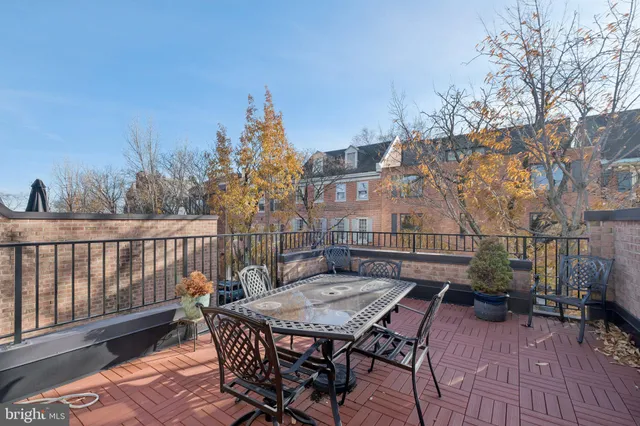a view of a chairs on the roof deck