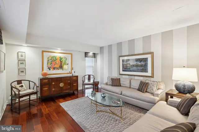 a living room with furniture and a couch