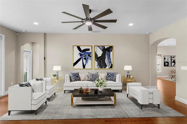 a kitchen with stainless steel appliances granite countertop a stove a sink and a window