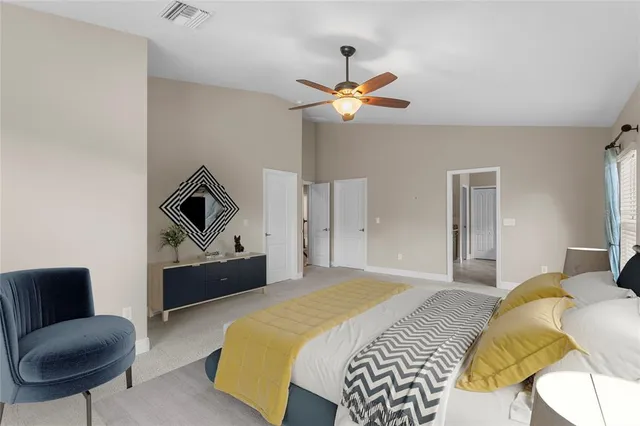 an aerial view of a house with a garden and a yard