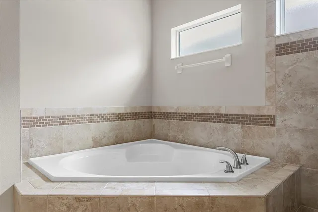 a aerial view of a house with a yard