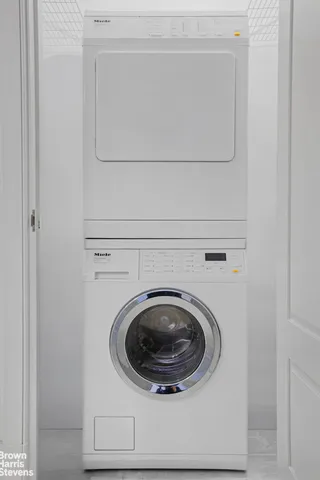 a bathroom with a granite countertop toilet a sink and bathtub