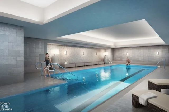 a view of a living room and dining room