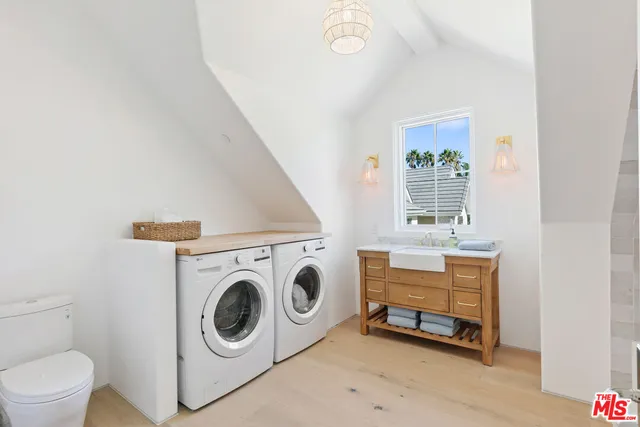 a view of a livingroom with furniture and a garden