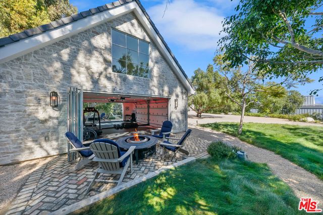 an aerial view of residential houses and city street
