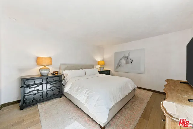 a view of a jacuzzi with a sink and garden