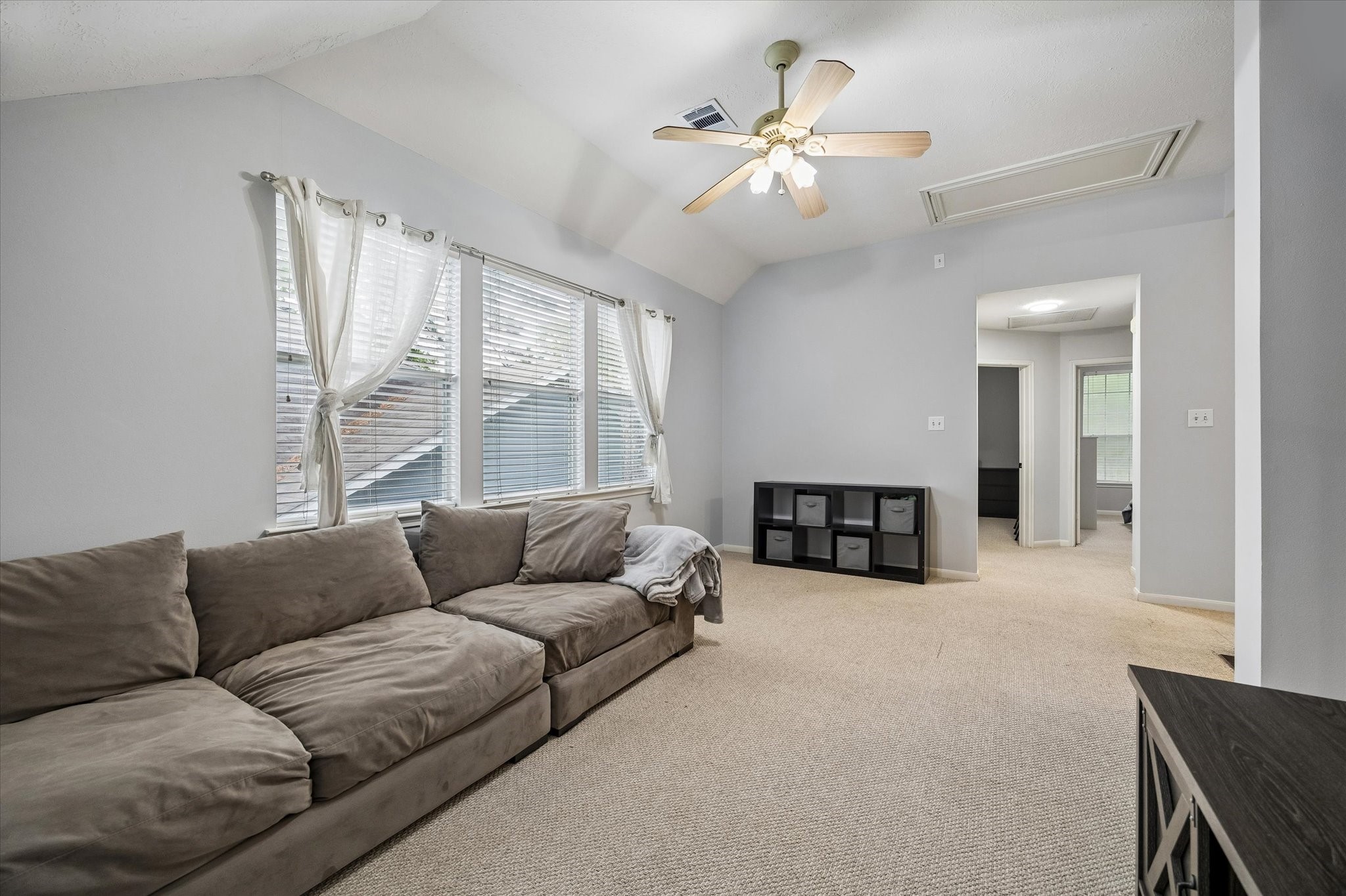 8123 Clarion Way Houston, TX 77040 - Photo 17 of 33 a living room with furniture and a large window