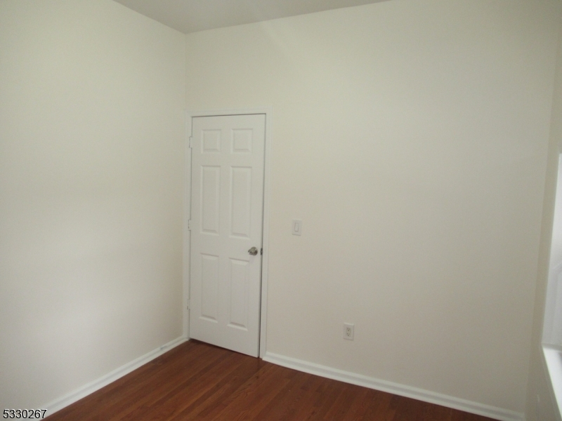 10 Humbert Street Nutley, NJ 07110 - Photo 11 of 16 a view of small space with wooden floor