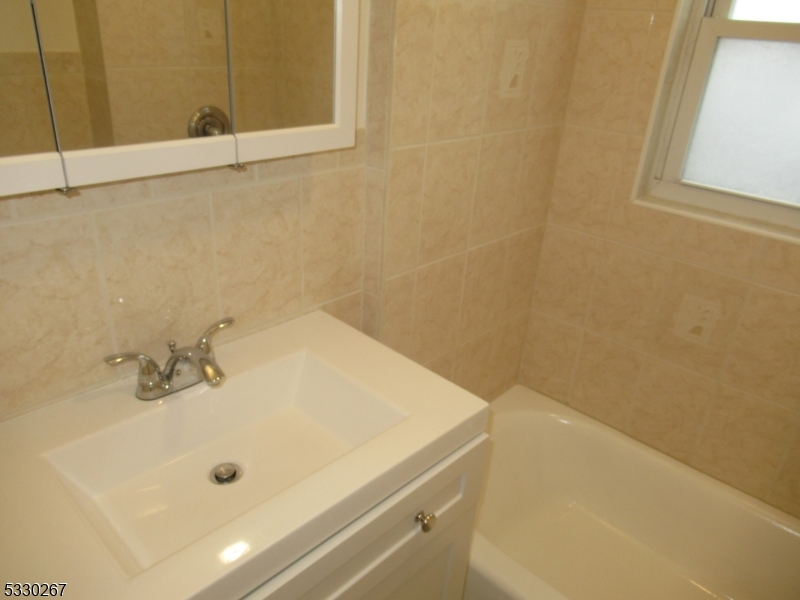 10 Humbert Street Nutley, NJ 07110 - Photo 15 of 16 a bathroom with a tub