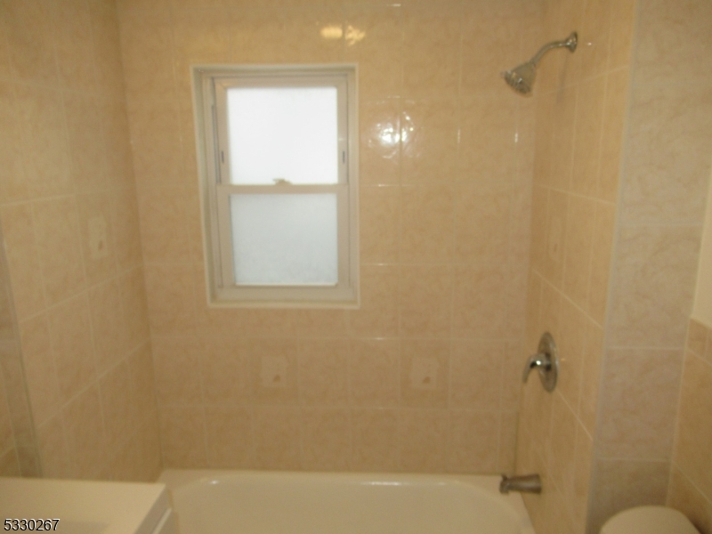 10 Humbert Street Nutley, NJ 07110 - Photo 16 of 16 a bathroom with a bathtub