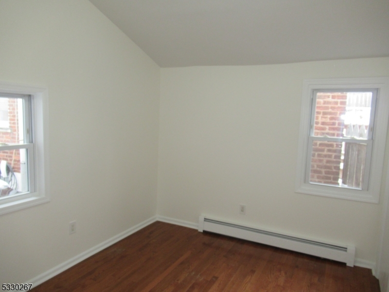 10 Humbert Street Nutley, NJ 07110 - Photo 10 of 16 an empty room with a window