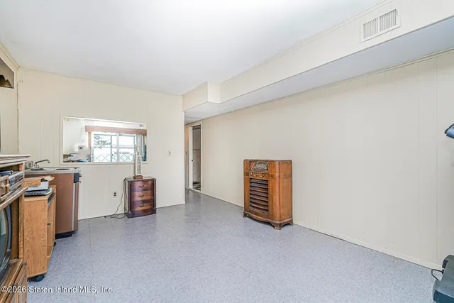a view of livingroom with furniture and windows