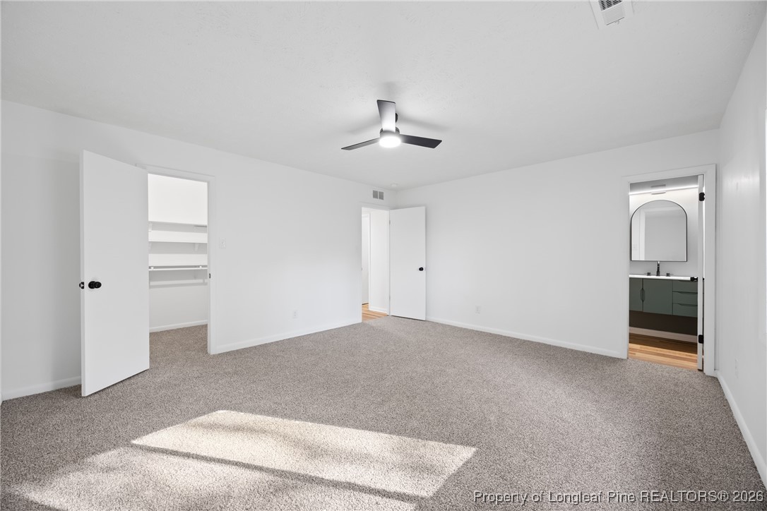 6541 Green Meadow Road Fayetteville, NC 28304 - Photo 19 of 35 wooden floor in an empty room with a window