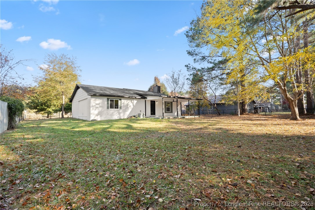 6541 Green Meadow Road Fayetteville, NC 28304 - Photo 32 of 35 a front view of house with yard and trees