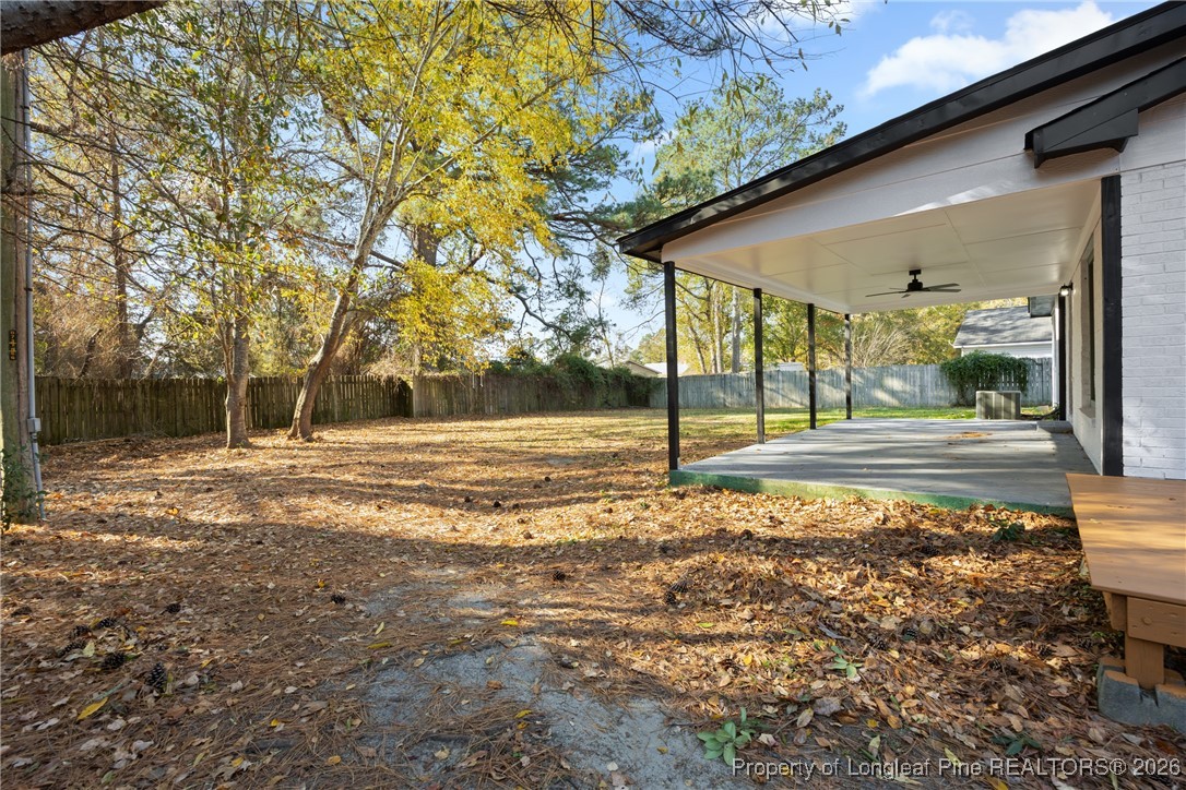 6541 Green Meadow Road Fayetteville, NC 28304 - Photo 34 of 35 a view of a house with backyard and trees
