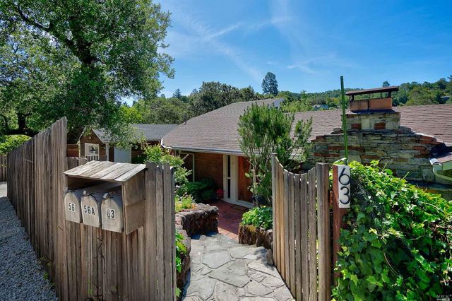 a house view with a garden space
