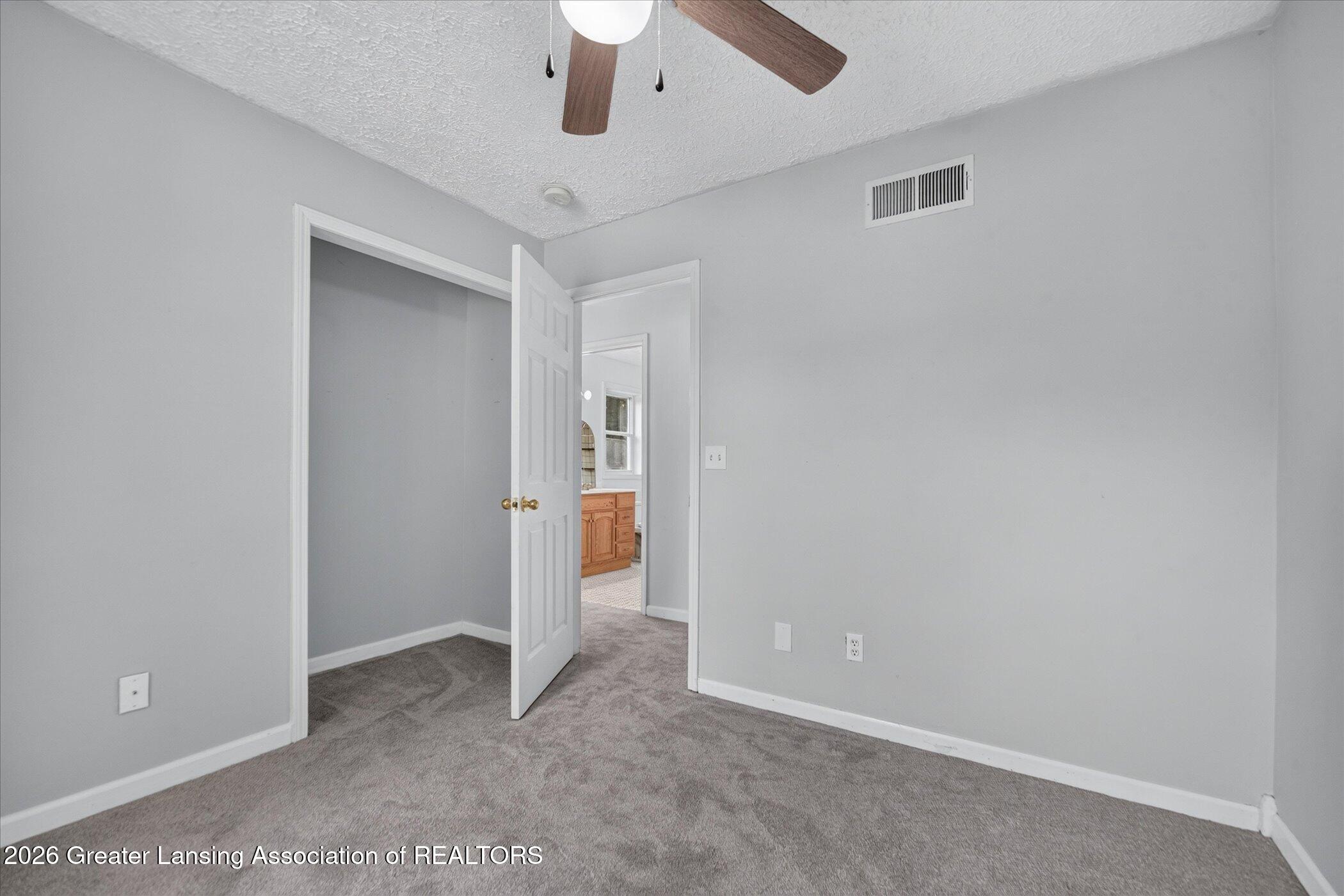 5855 Edson Street Haslett, MI 48840 - Photo 19 of 38 20-5855-Edson-St-WindowStill