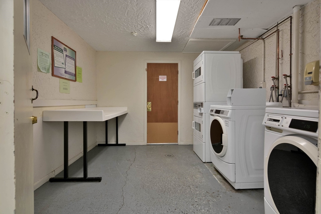 294 Codman Hill Road, Unit 33F Boxborough, MA 01719 - Photo 13 of 31 a utility room with dryer and washer