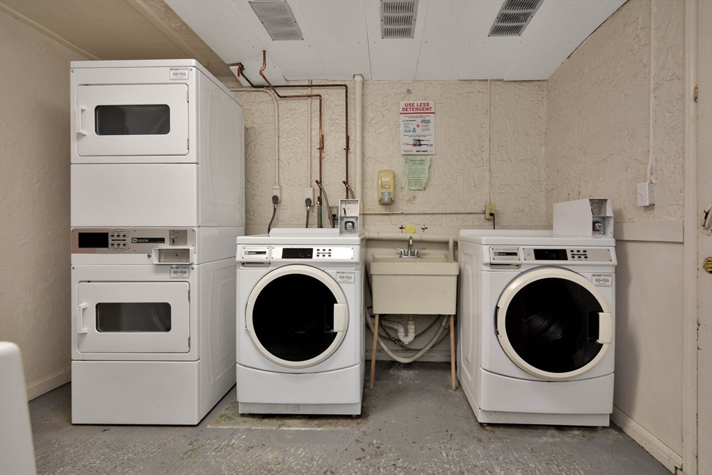 294 Codman Hill Road, Unit 33F Boxborough, MA 01719 - Photo 14 of 31 a utility room with dryer and washer