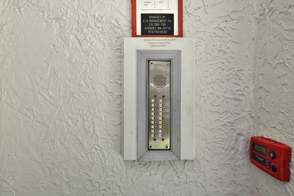 294 Codman Hill Road, Unit 33F Boxborough, MA 01719 - Photo 16 of 31 a view of a door with a wall