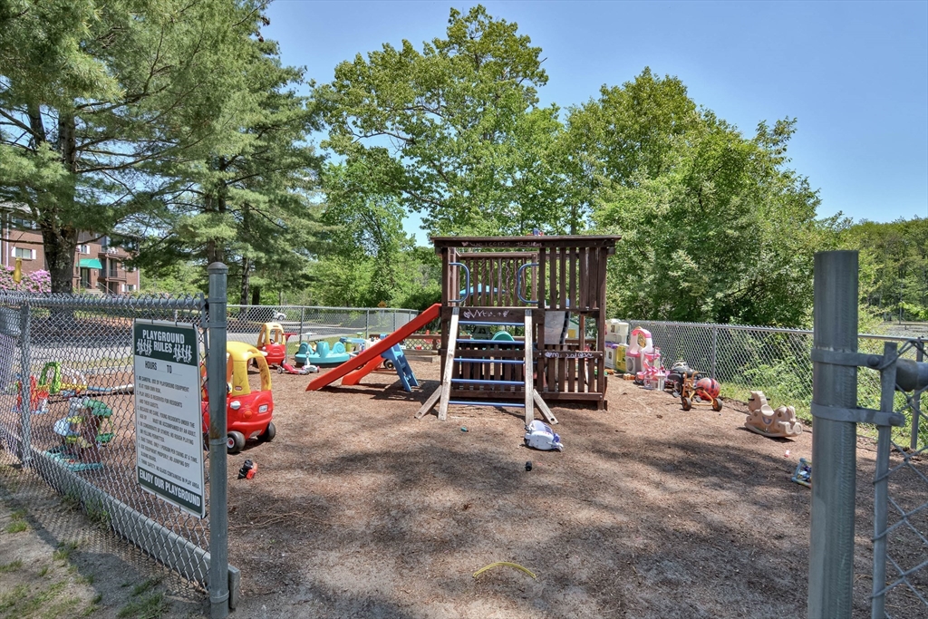 294 Codman Hill Road, Unit 33F Boxborough, MA 01719 - Photo 23 of 31 a view of outdoor space with trampoline