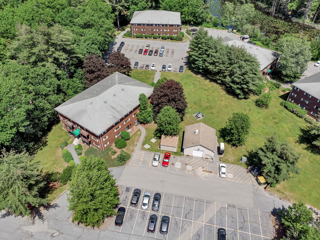 294 Codman Hill Road, Unit 33F Boxborough, MA 01719 - Photo 26 of 31 an aerial view of a house with a yard