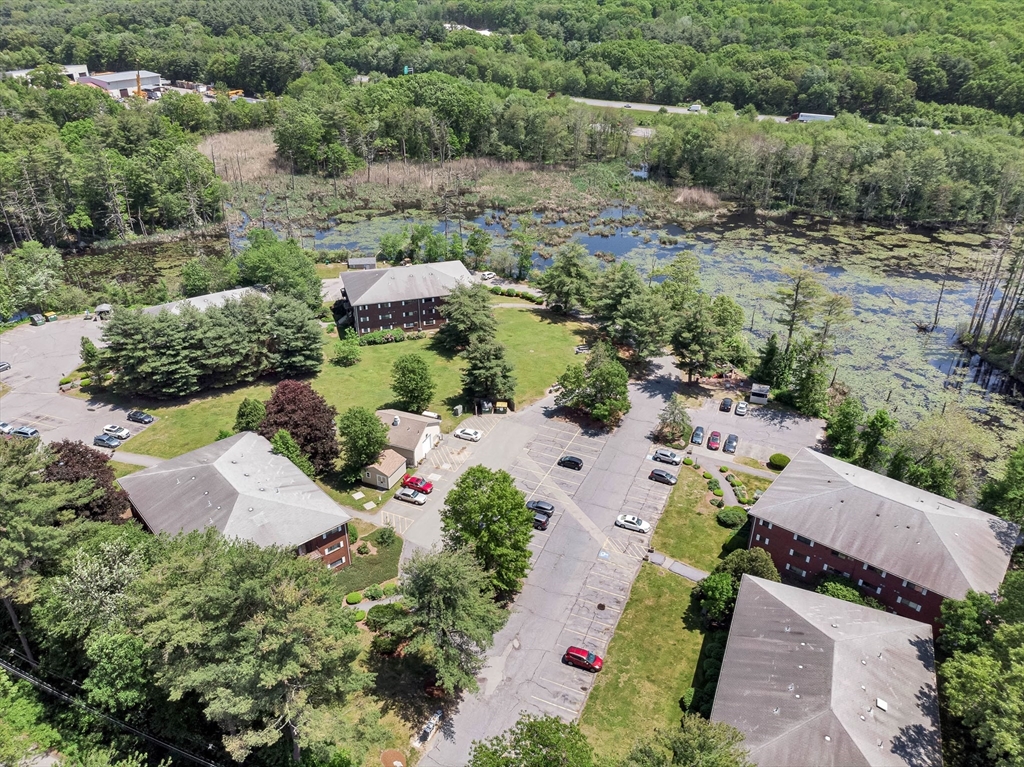 294 Codman Hill Road, Unit 33F Boxborough, MA 01719 - Photo 28 of 31 an aerial view of house with yard