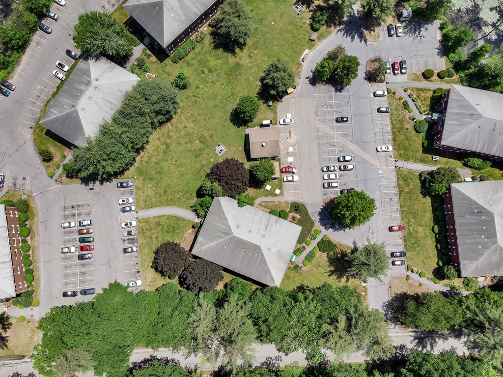 294 Codman Hill Road, Unit 33F Boxborough, MA 01719 - Photo 29 of 31 an aerial view of a house with a garden