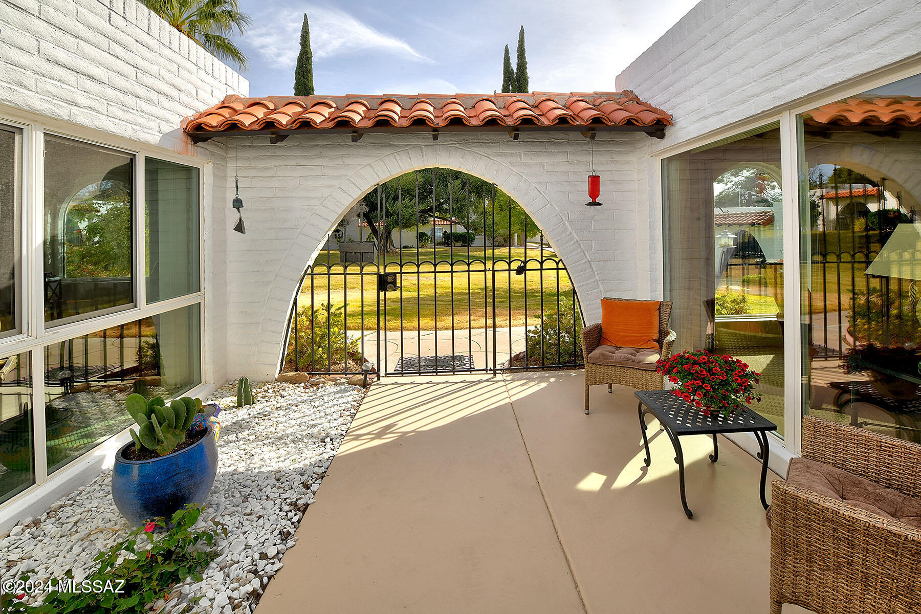 729 West Las Lomitas Road Tucson, AZ 85704 - Photo 9 of 40 GATED PATIO WITH VIEW OF GRASS & TREES