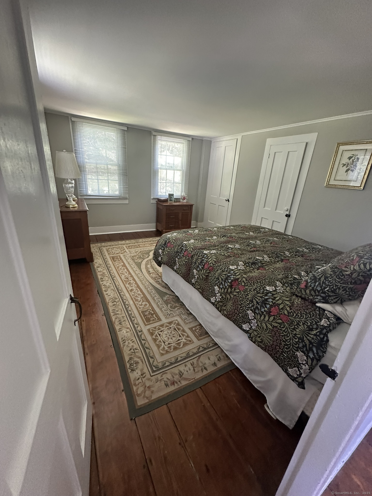57 Castle Meadow Road Newtown, CT 06470 - Photo 16 of 21 a living room with wooden floor and furniture