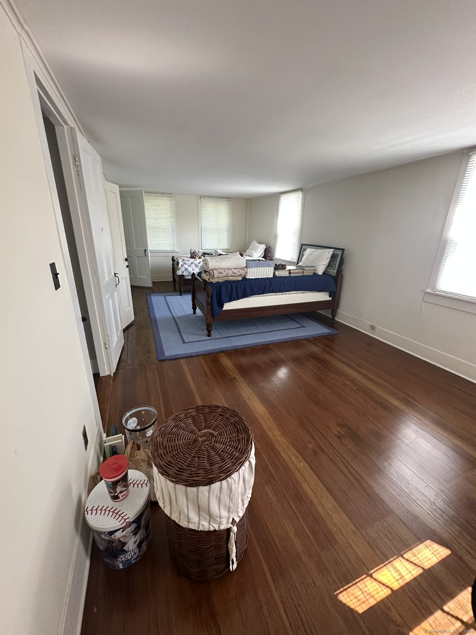 57 Castle Meadow Road Newtown, CT 06470 - Photo 17 of 21 a living room with furniture and a rug