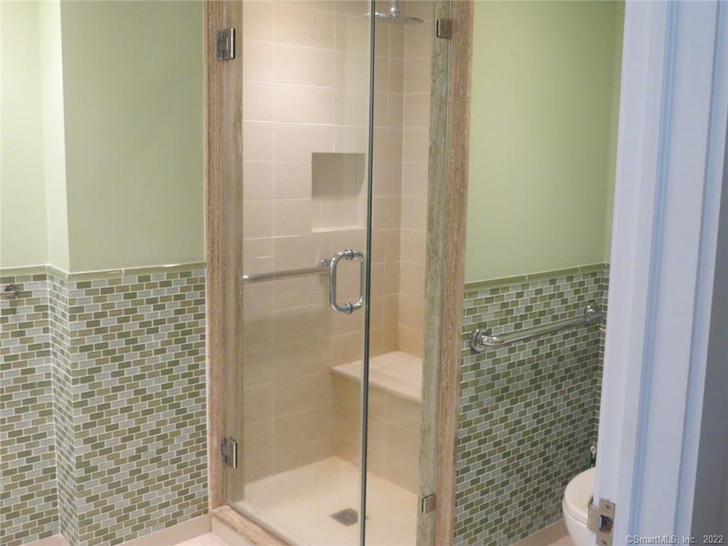 57 Castle Meadow Road Newtown, CT 06470 - Photo 4 of 21 a bathroom with a shower