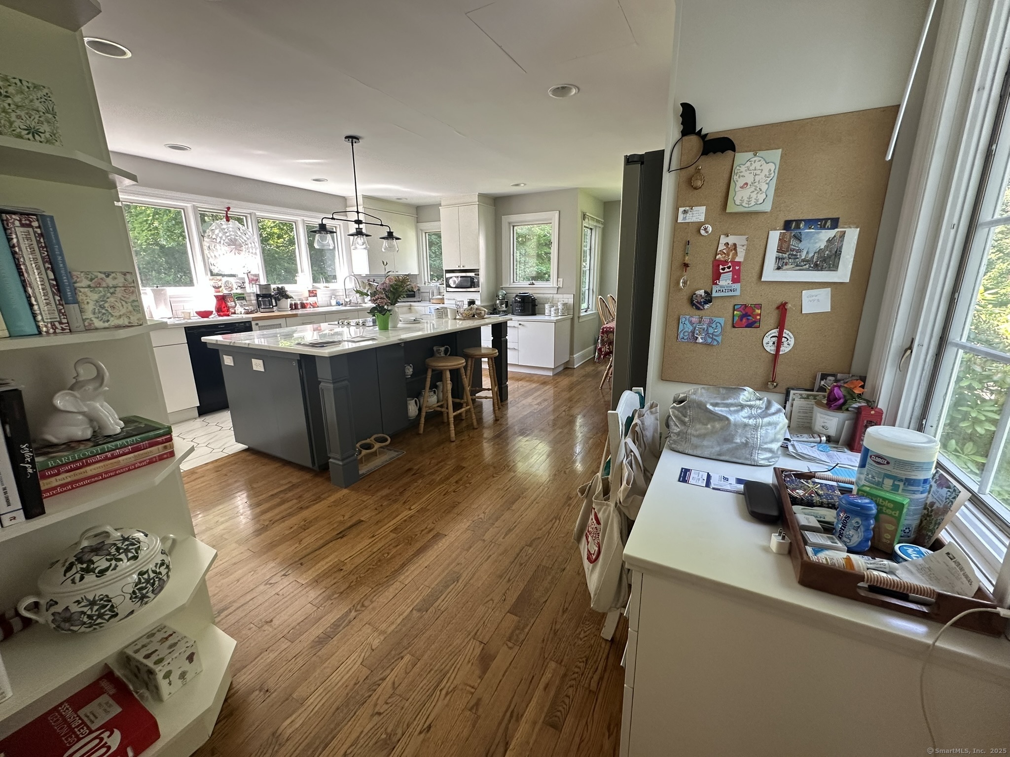 57 Castle Meadow Road Newtown, CT 06470 - Photo 8 of 21 a living room with furniture and a kitchen