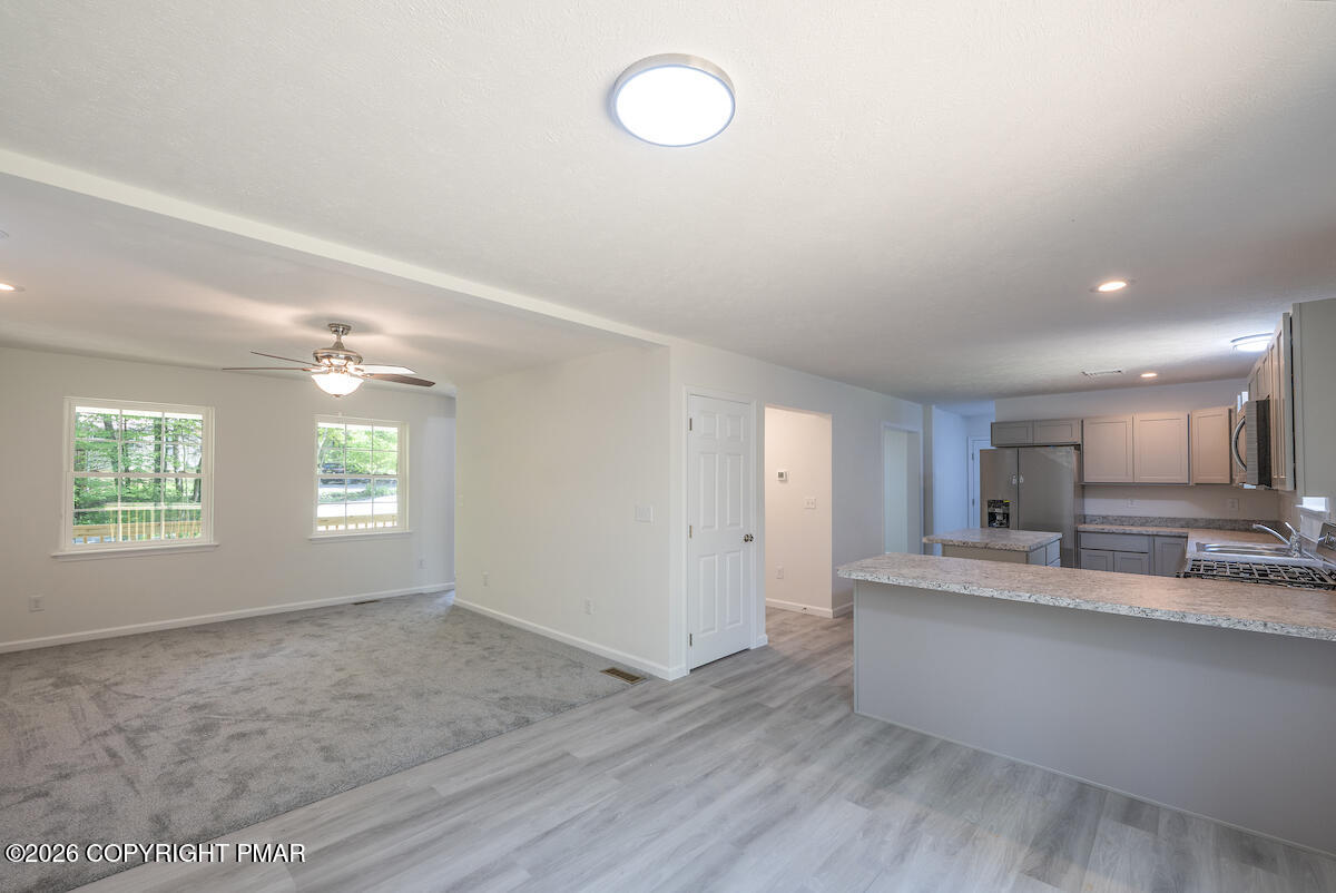 1125 Glouster Road, Unit 3209 Tobyhanna, PA 18466 - Photo 16 of 53 a view of a kitchen with marble kitchen and sink