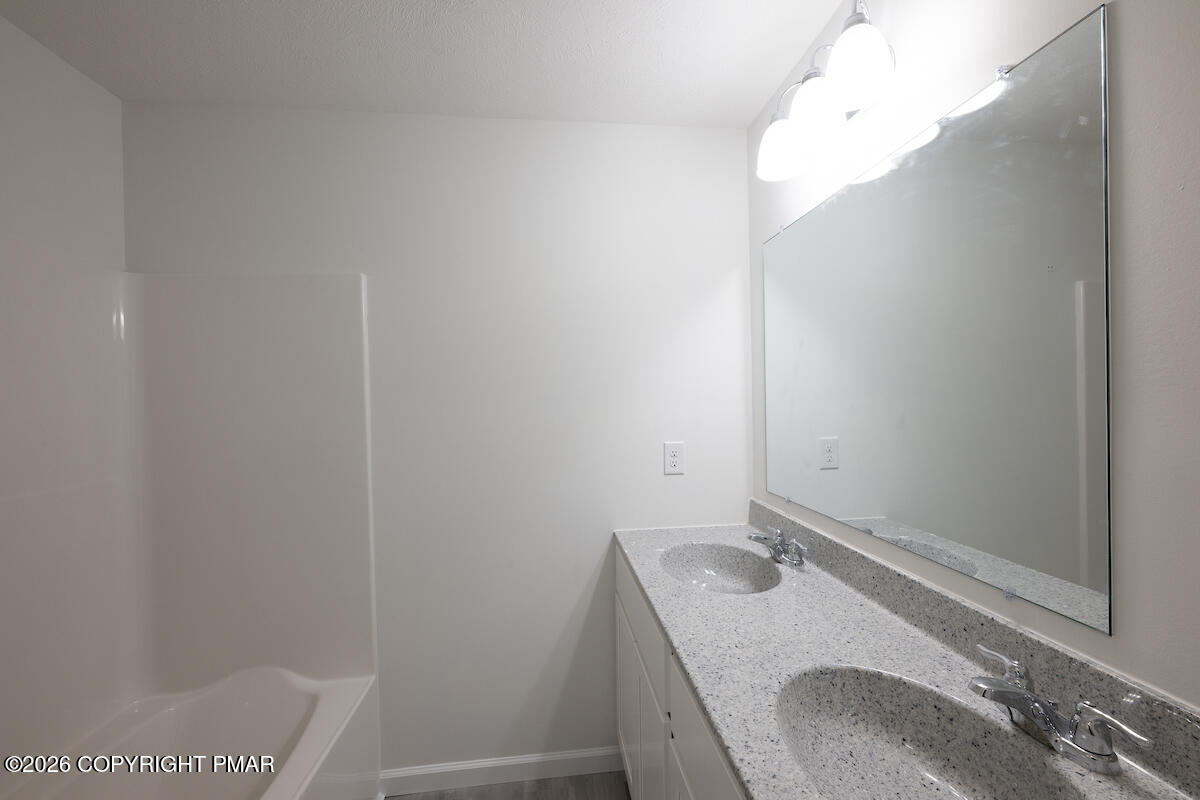1125 Glouster Road, Unit 3209 Tobyhanna, PA 18466 - Photo 34 of 53 a bathroom with a sink and a vanity