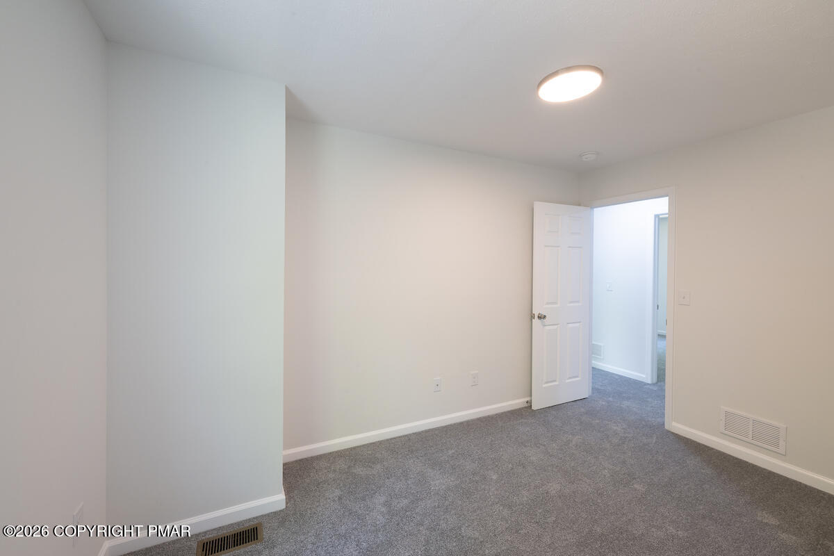 1125 Glouster Road, Unit 3209 Tobyhanna, PA 18466 - Photo 40 of 53 a view of an empty room