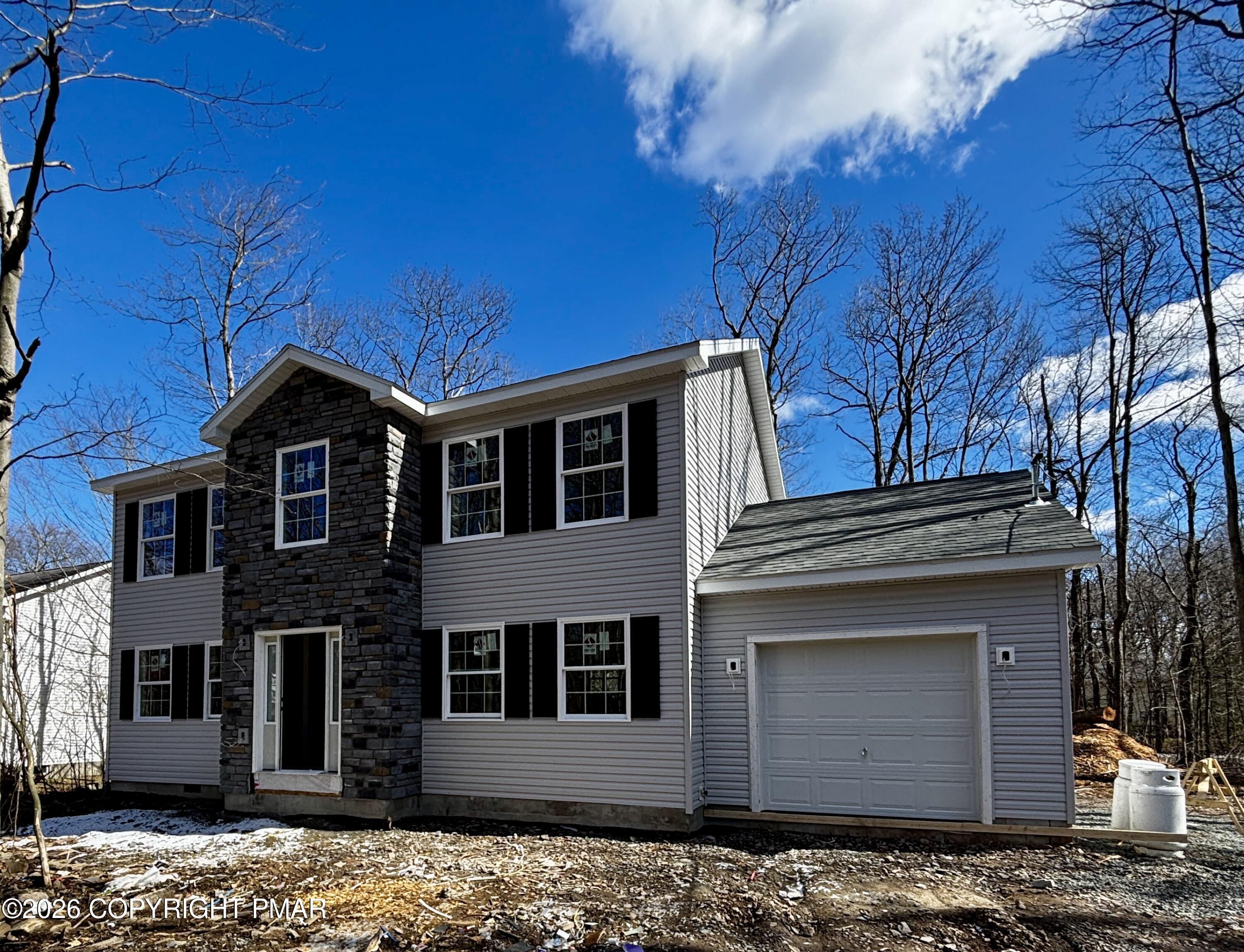 1125 Glouster Road, Unit 3209 Tobyhanna, PA 18466 - Photo 53 of 53 a front view of a house with a yard