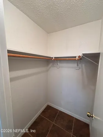 a view of a room with racks on the wall