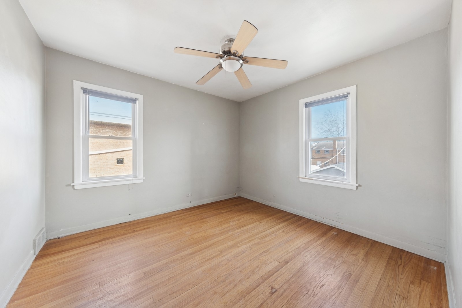 9331 South Pulaski Road Evergreen Park, IL 60805 - Photo 11 of 29 a view of an empty room with wooden floor and a window