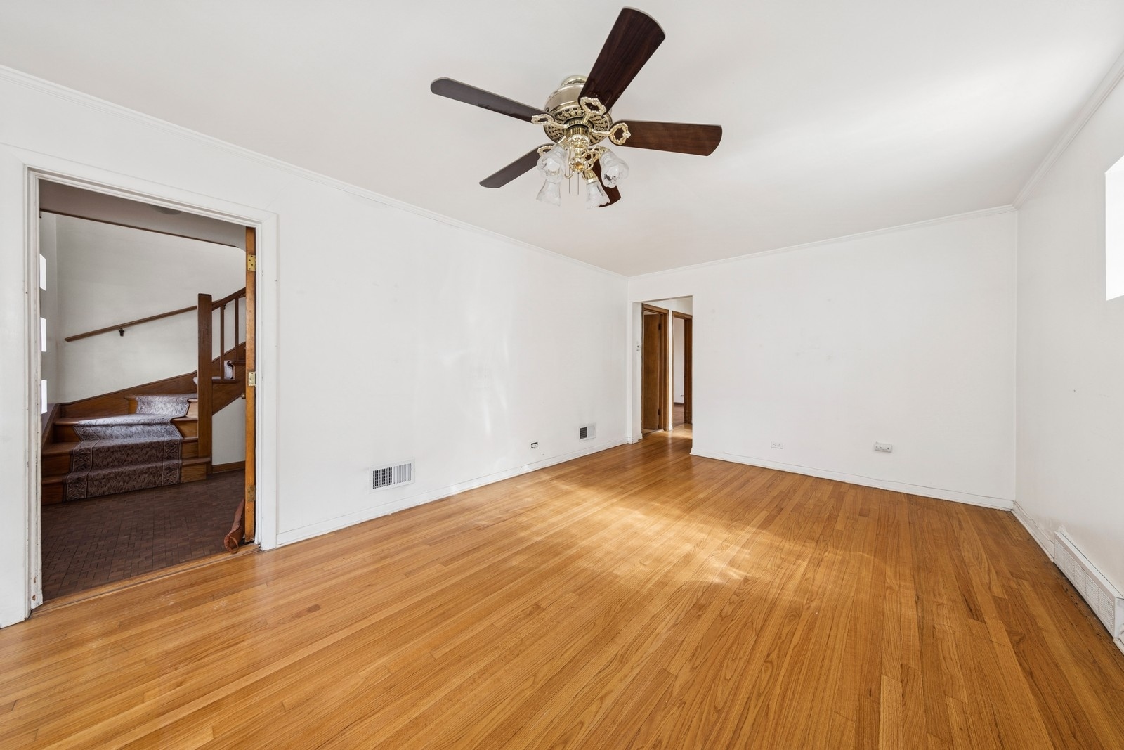 9331 South Pulaski Road Evergreen Park, IL 60805 - Photo 17 of 29 an empty room with wooden floor closet and windows