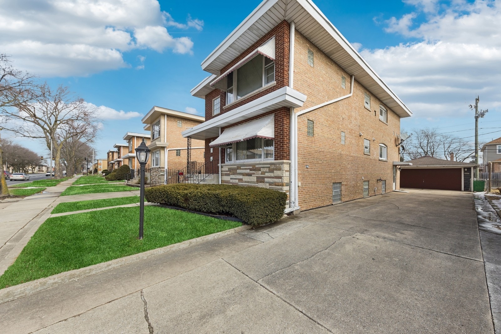 9331 South Pulaski Road Evergreen Park, IL 60805 - Photo 2 of 29 a view of a house with a yard