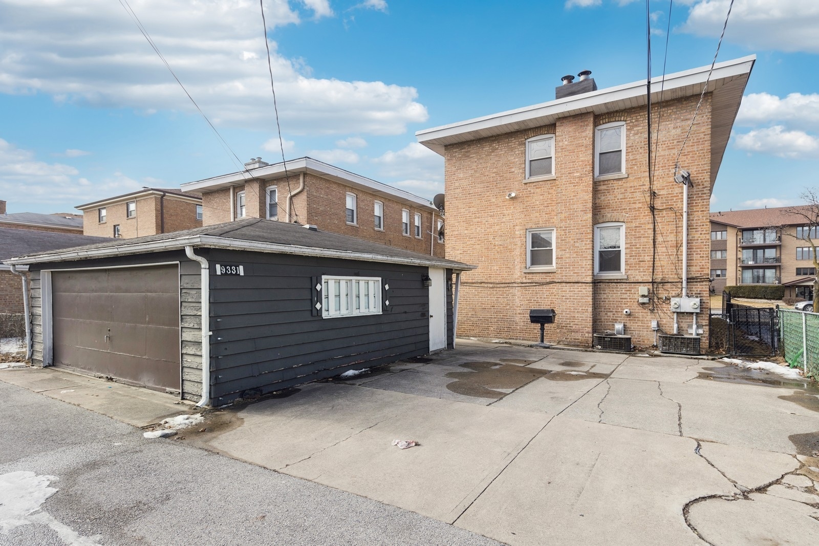 9331 South Pulaski Road Evergreen Park, IL 60805 - Photo 25 of 29 a front view of a house with a garage
