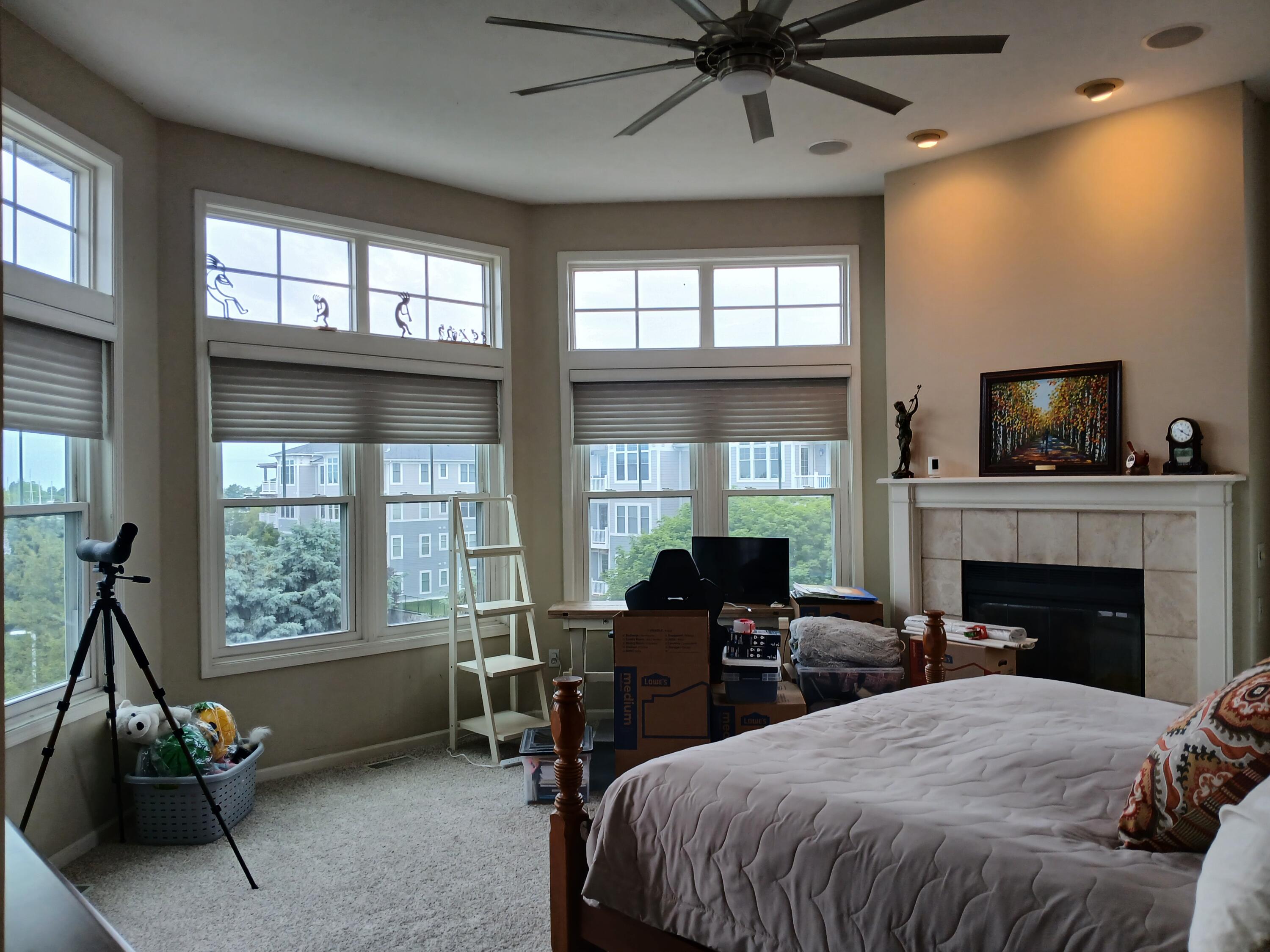 300 South Rath Avenue, Unit 5 Ludington, MI 49431 - Photo 22 of 28 Upper Floor Primary Bedroom